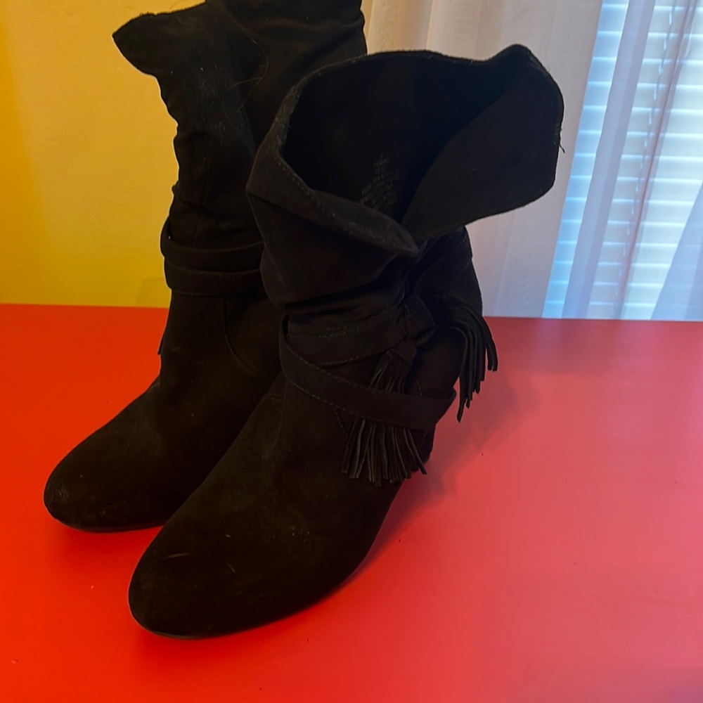 Express faux suede tassel slouchy ankle boot.